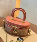 Round Handbag with Chain and Elegant Handle